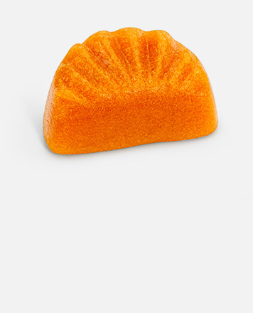 Vegana Un chicle de una sola fruta con forma de gajo de mandarina.